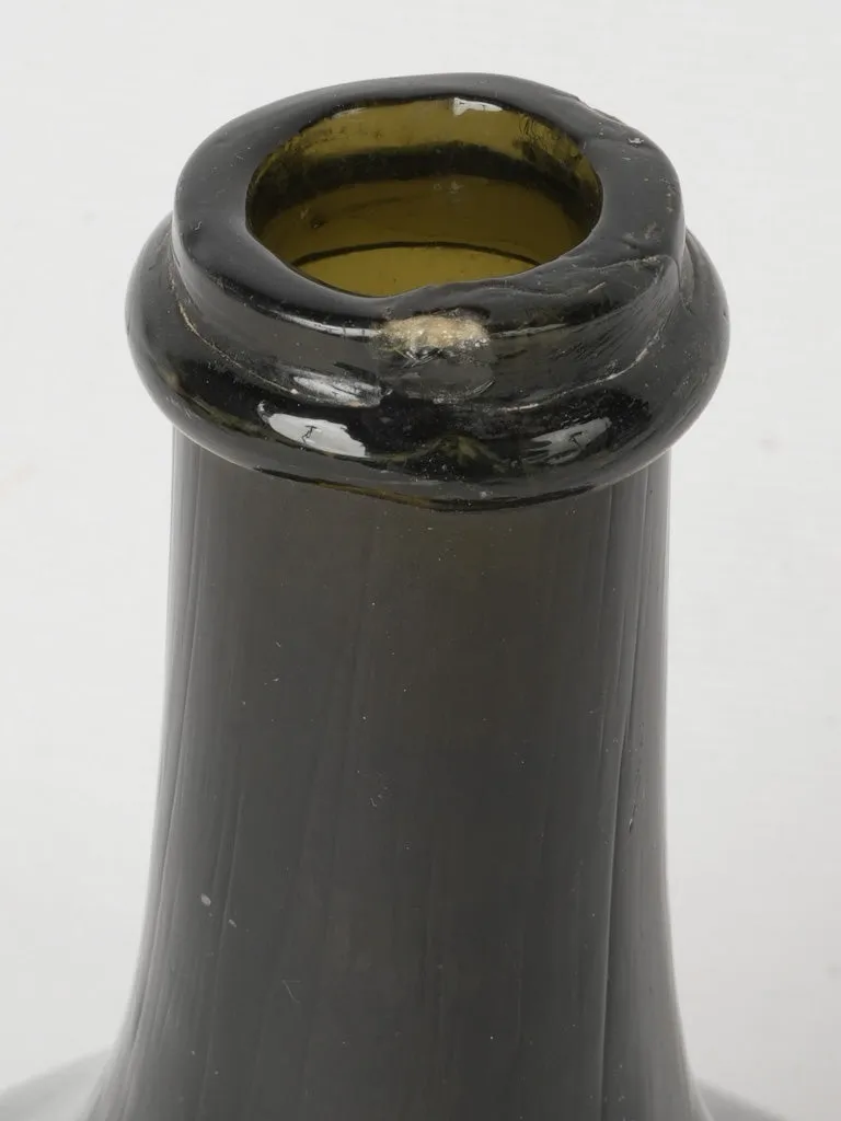 19th century Trinquetaille black glass bottle 8"