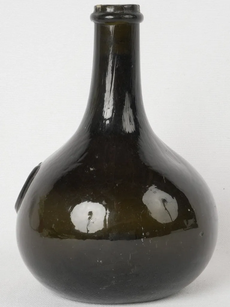 19th century Trinquetaille black glass bottle 8"