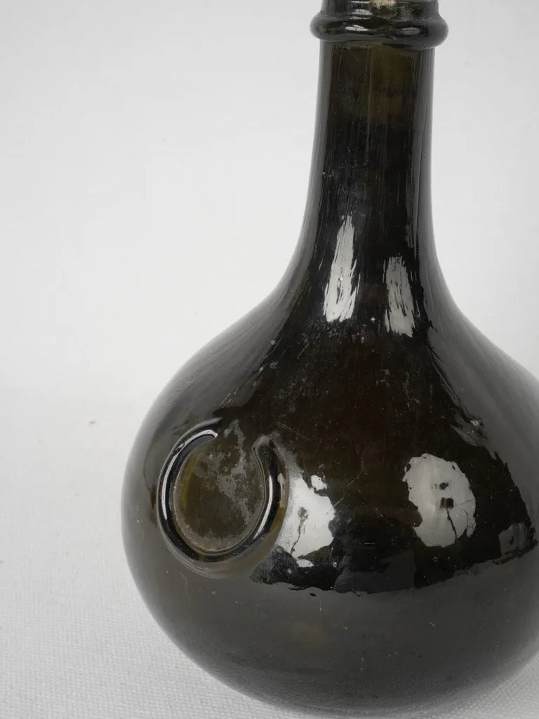 19th century Trinquetaille black glass bottle 8"