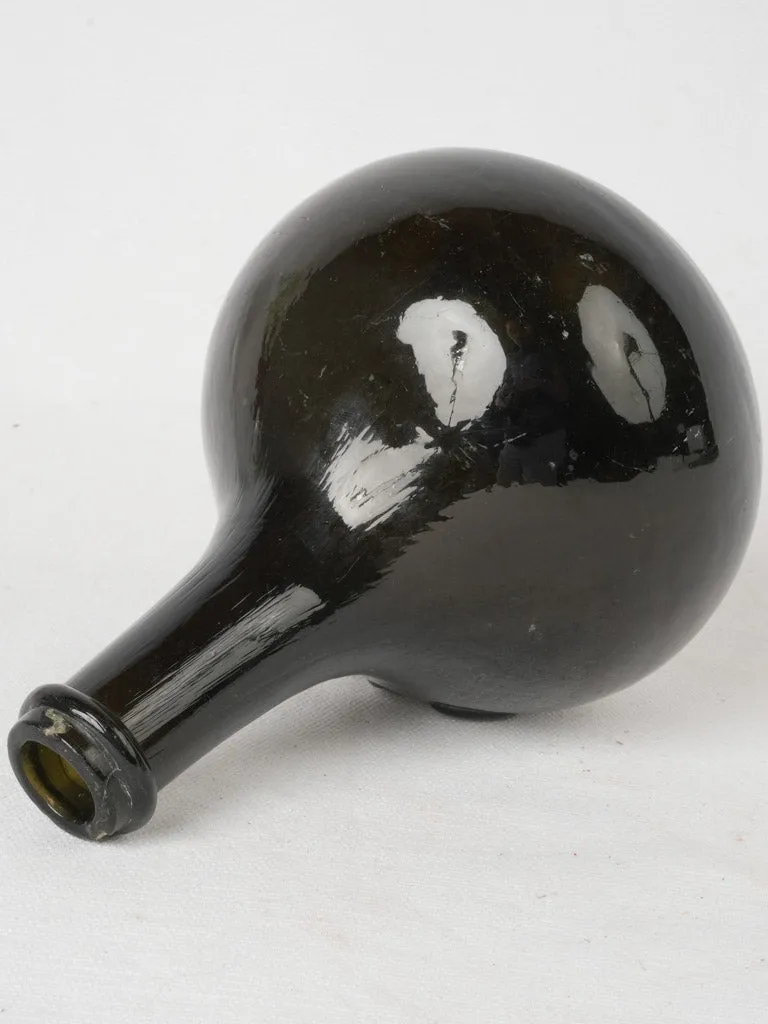 19th century Trinquetaille black glass bottle 8"