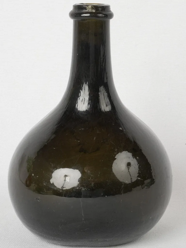 19th century Trinquetaille black glass bottle 8"