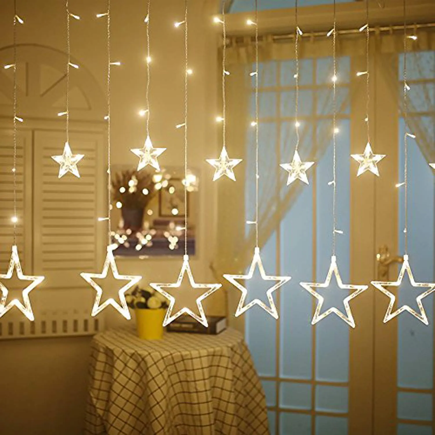 Kuber Industries 138 LED Curtain String Lights with 8 Flashing Modes Decoration(12 Stars, Warm White), Pack of 2 - CTKTC022958