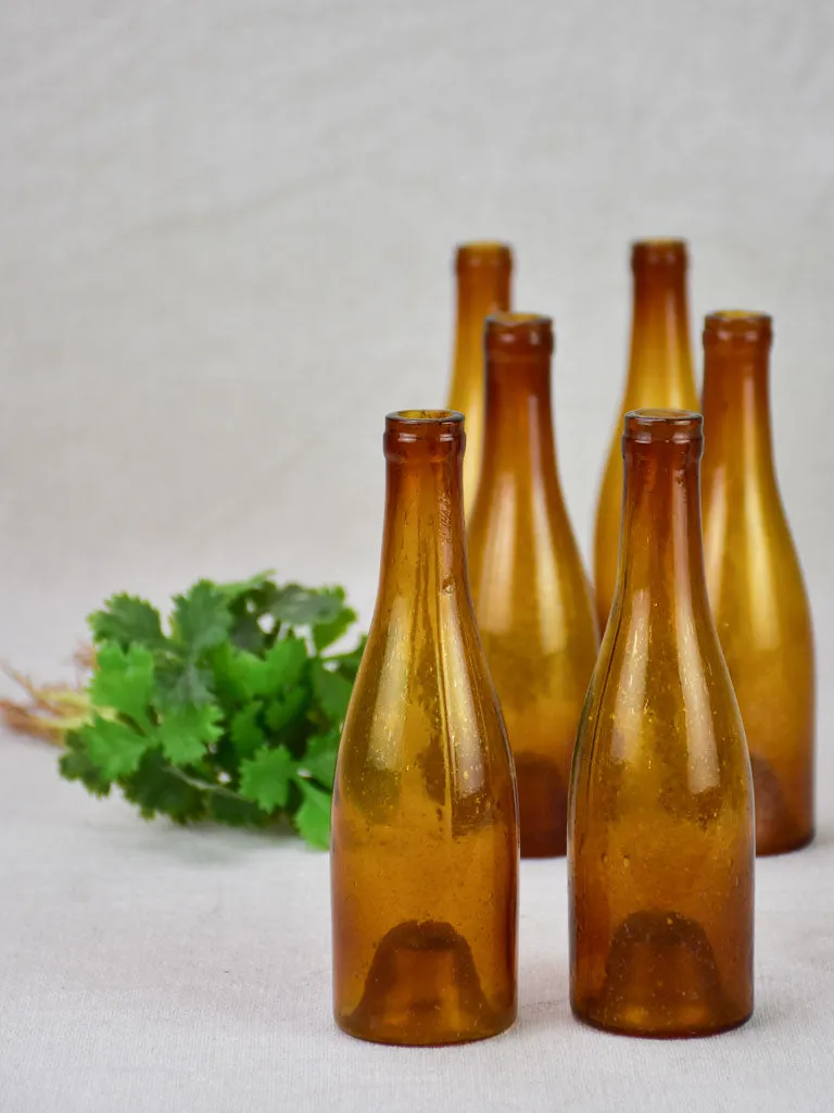 Set of six amber glass miniature bottles from the 19th century 6¼"