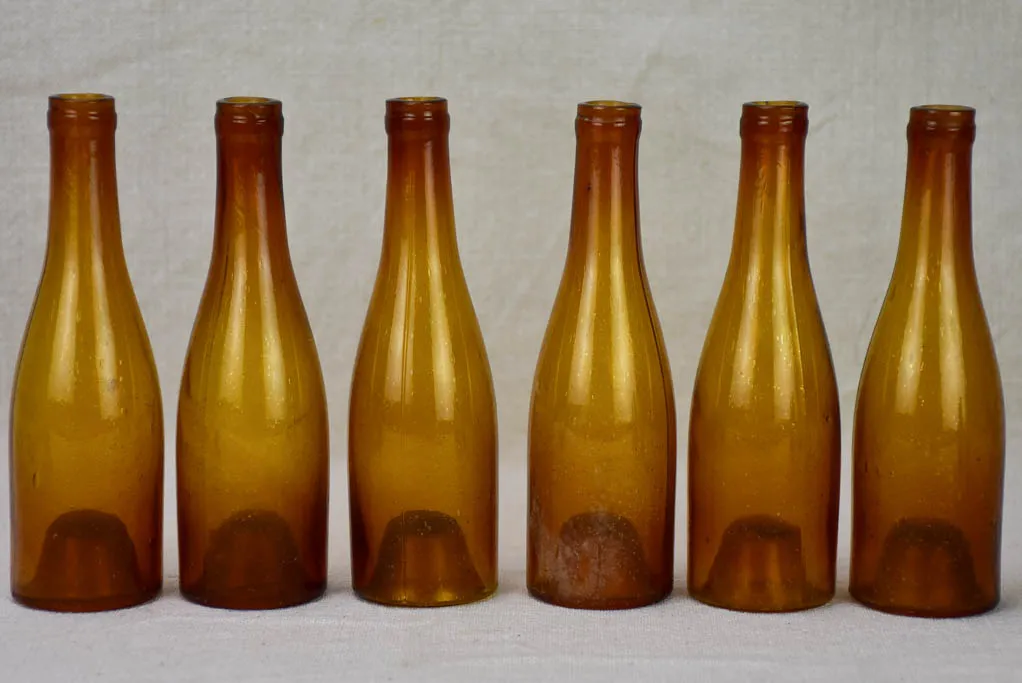 Set of six amber glass miniature bottles from the 19th century 6¼"