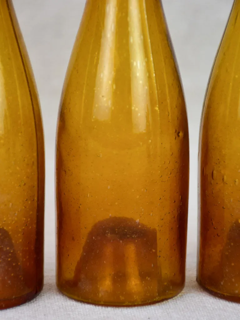 Set of six amber glass miniature bottles from the 19th century 6¼"